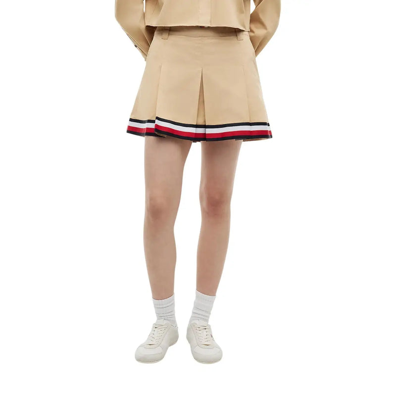 Tommy Hilfiger women beige organic cotton mini skirt with pleats and red white black striped hemband