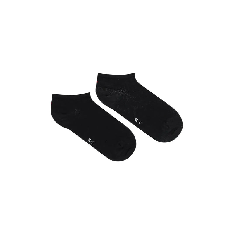 Schwarze Baumwolle Tommy Hilfiger Damen-Knöchelsocken mit dezentem weißen Schriftzug und einem schwachen Muster im Fersenbereich