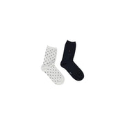 Ein Paar Tommy Hilfiger Damensocken, eine weiß-schwarz gepunktet und die andere marineblau, aus Baumwollmischgewebe, Größe S