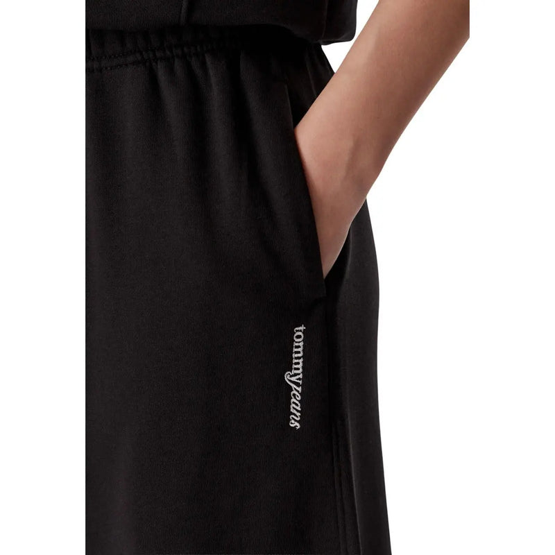Schwarze Tommy Hilfiger Damen-Jogginghose aus Baumwolle mit weitem Bein, gerippter Struktur und dezentem, weiß gesticktem Logo an der Seitennaht