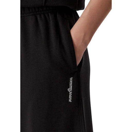 Schwarze Tommy Hilfiger Damen-Jogginghose aus Baumwolle mit weitem Bein, gerippter Struktur und dezentem, weiß gesticktem Logo an der Seitennaht