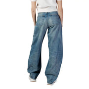 Back side of tommy hilfiger women’s wide-leg medium-wash blue organic cotton denim jeans with subtle stitching