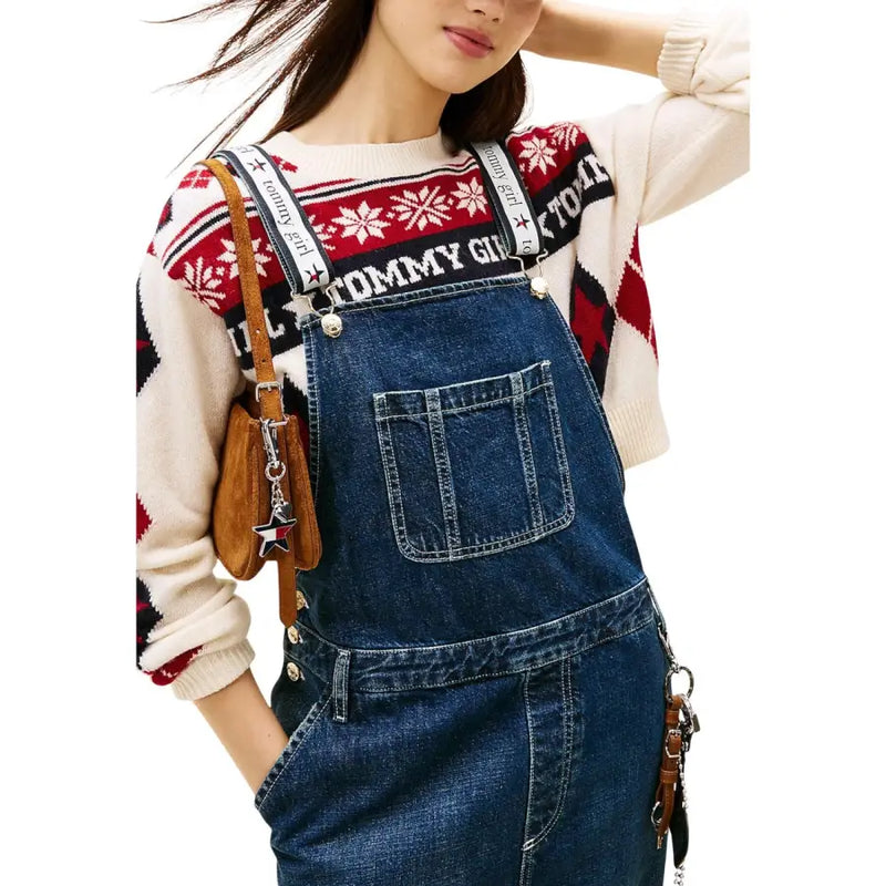 Tommy Hilfiger women’s blue organic cotton denim overalls with white stitching and adjustable straps featuring tommy girl branding