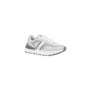 Tommy Hilfiger women’s grey leather sneakers with mesh upper, striped side panel, and chunky sole