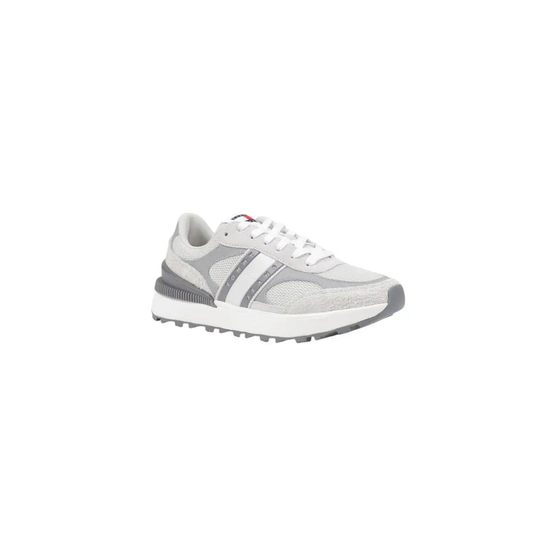 Tommy Hilfiger women’s grey leather sneakers with mesh upper, striped side panel, and chunky sole