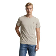 Beiges Herren-T-Shirt der US Polo Assn. aus Baumwolle, klassische Passform, kurze Ärmel, Rundhalsausschnitt und kleines, gesticktes Logo auf der Brust.