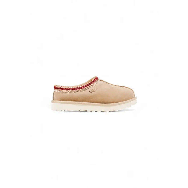 Ugg beige leather slip-on moccasin with red trim and white sole
