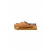 Tan suede UGG slip-on mule with zigzag trim in beige leather