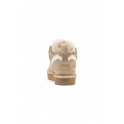 Beige suede ugg women lowmel sneakers with white accents and plush shearling lining for comfortable wear