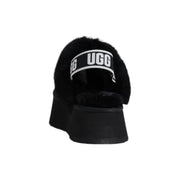 Black ugg women suede leather slippers with plush shearling lining and a thick platform sole slip-on slide design