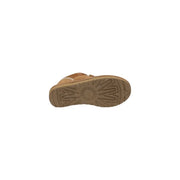 Tan ugg women’s sneaker with suede upper and rubber sole featuring ugg starburst tread pattern