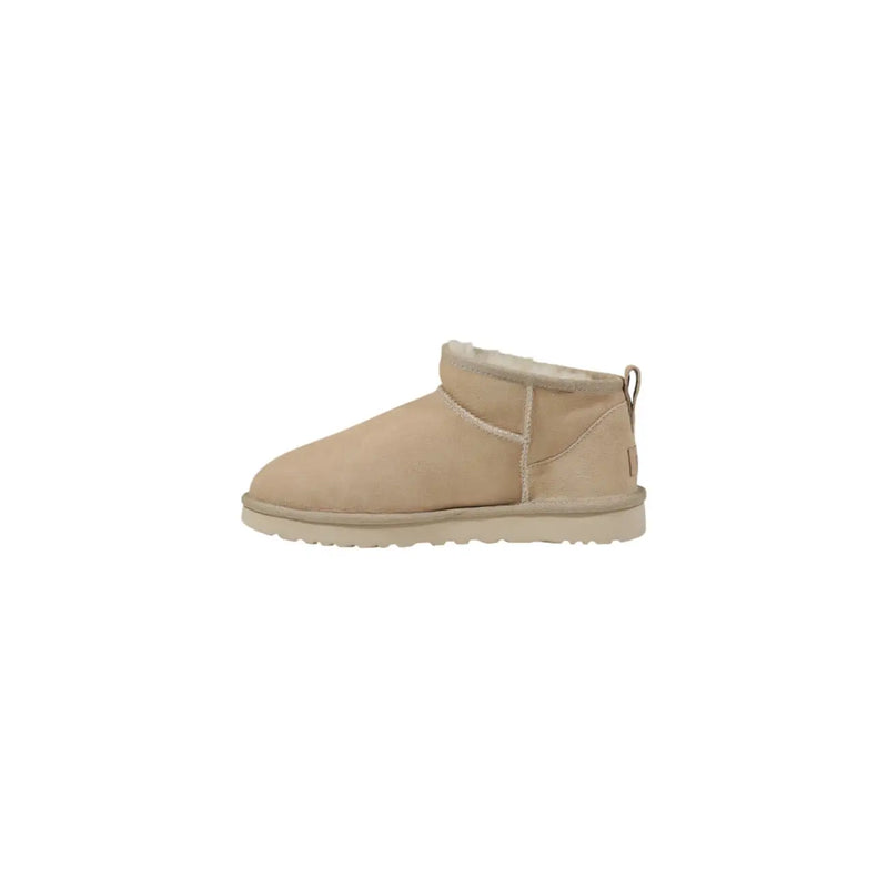 Beige ugg women leather mini boot with soft shearling lining and suede exterior for spring footwear