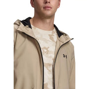 Under Armour Beigefarbener Herren-Kapuzenpullover mit durchgehendem Reißverschluss, gewebt, mit schwarzem Innenfutter und Reißverschlussbesatz.