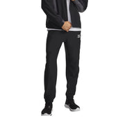Under armour men trousers in black sweatpant style with subtle white logo on left thigh for athletic wear