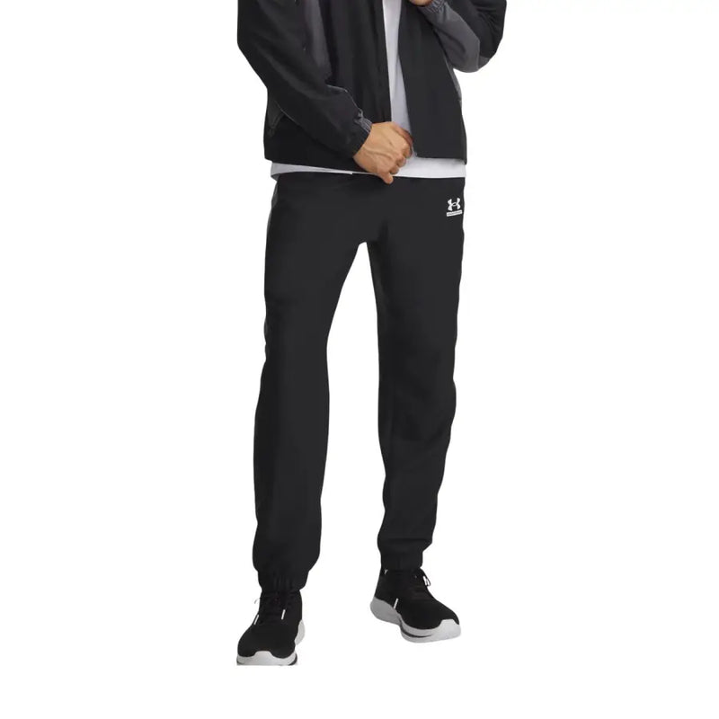 Under armour Herrenhose im Jogginghosen-Stil, schwarz, mit dezentem weißen Logo am linken Oberschenkel, für sportliche Aktivitäten