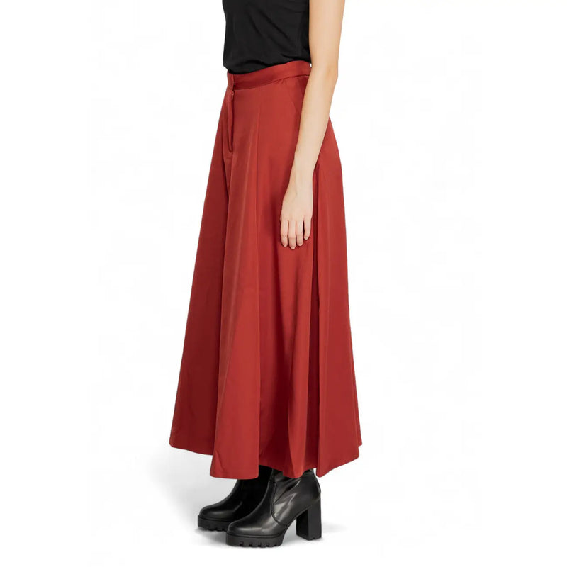 Vero Moda red polyester skirt for women with rust red satin finish and asymmetrical hemline for fall winter