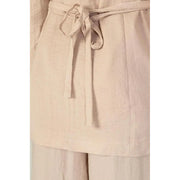 Beige linen belted dress with soft textured fabric and matching self-tie belt shown with vero moda pink blazer