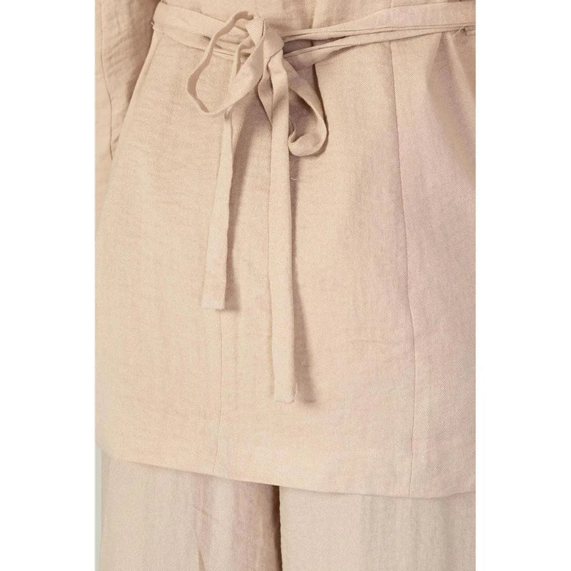 Beige linen belted dress with soft textured fabric and matching self-tie belt shown with vero moda pink blazer