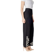 Black high-waisted wide-leg Vila Clothes cotton linen viscose trousers with elegant white embroidered floral patterns