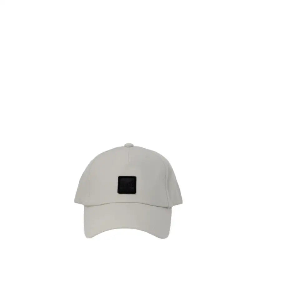 
                      
                        Boss Men Cap featuring white baseball cap with black patch for urban city style fashion
                      
                    