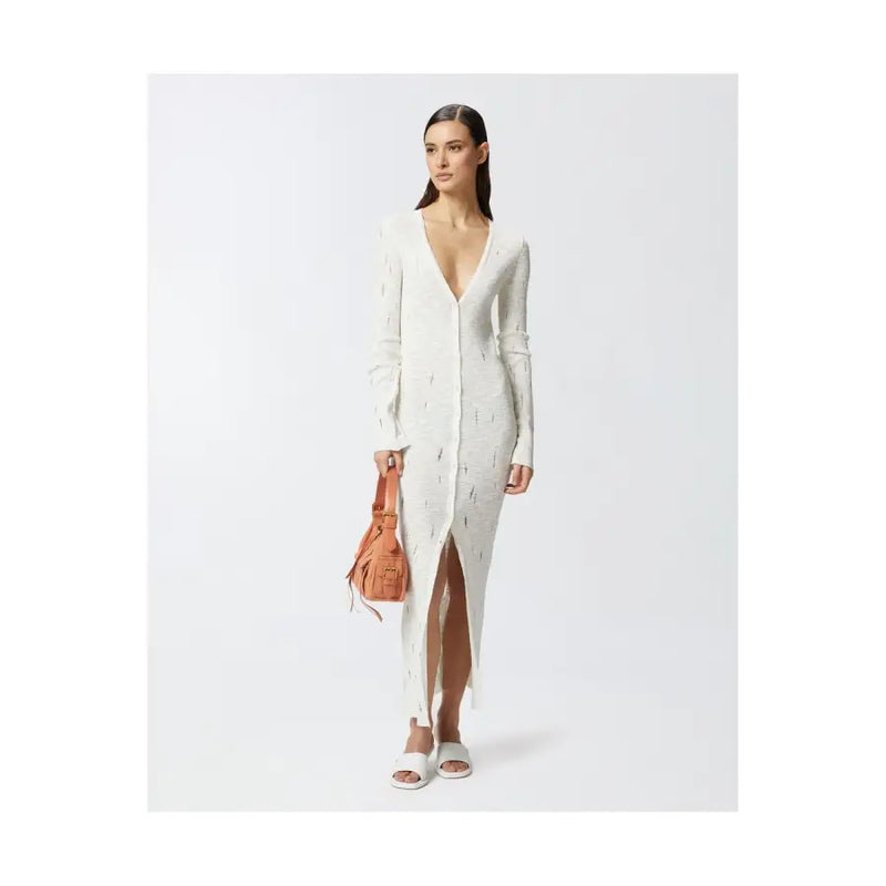 Long white cotton knit dress by Pinko with deep v neck and side slit button front design