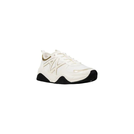 White and gold Armani Exchange women’s athletic sneaker with black rubber sole