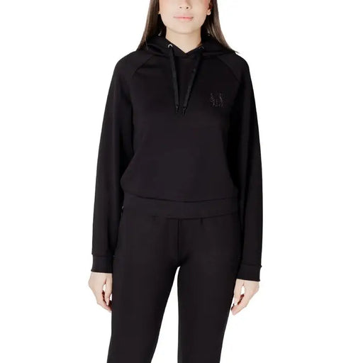 Black hooded sweatshirt and leggings set displayed with a White Hooded Sweatshirt and Leggings Set model