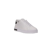 White leather sneaker with black heel accent from White Leather Sneaker with Black Accents