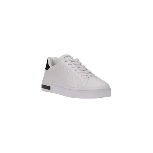 White leather sneaker with black heel accent from White Leather Sneaker with Black Accents