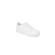 White leather New Balance women’s sneakers size 3 displayed on a neutral background