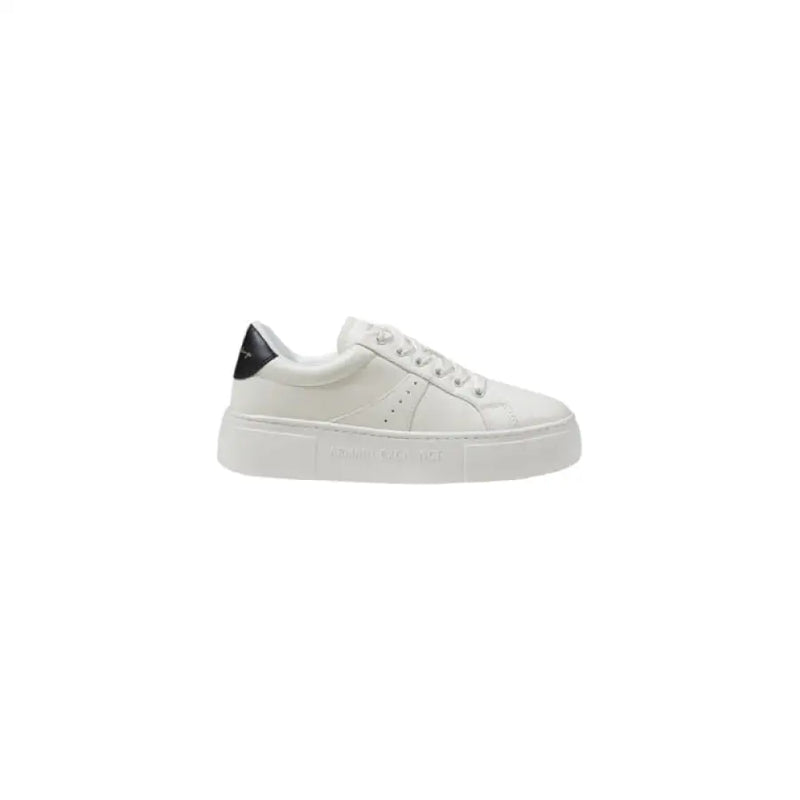 White leather sneaker with black heel accent for stylish casual footwear