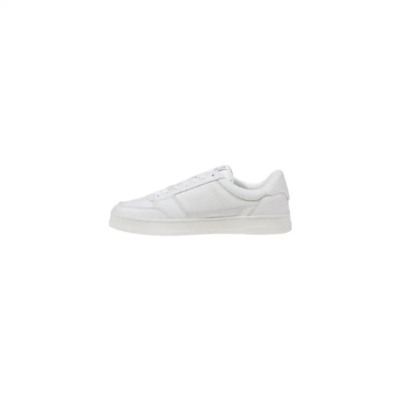 White leather Tommy Hilfiger sneaker displayed in a product image