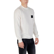 White long-sleeved crewneck sweatshirt displayed in a product image