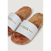 White slide sandals with map print and cork sole for casual comfort