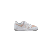 White and pink New Balance women’s sneakers size 3 on display