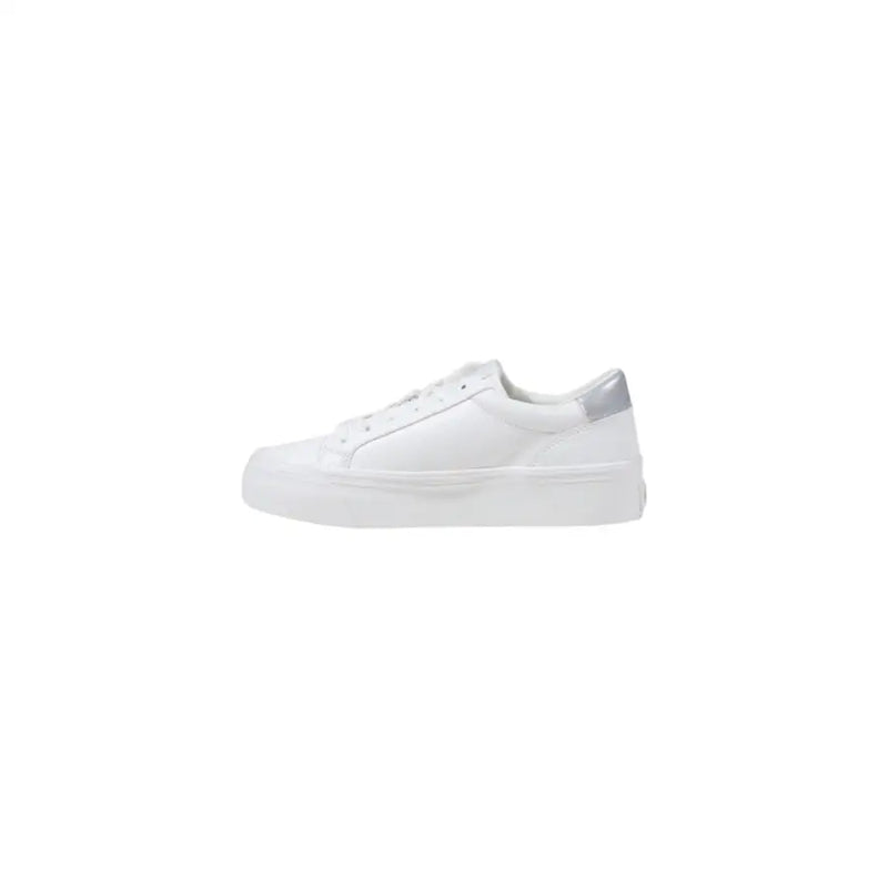 White platform sneakers with silver heel accents from Calvin Klein for women