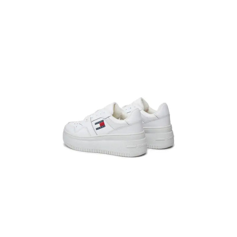 White platform sneakers from Tommy Hilfiger featured in a stylish product display