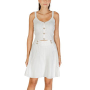 Guess White Strappy Round Neck Top paired with white ribbed knit button-front crop top and pleated mini skirt set
