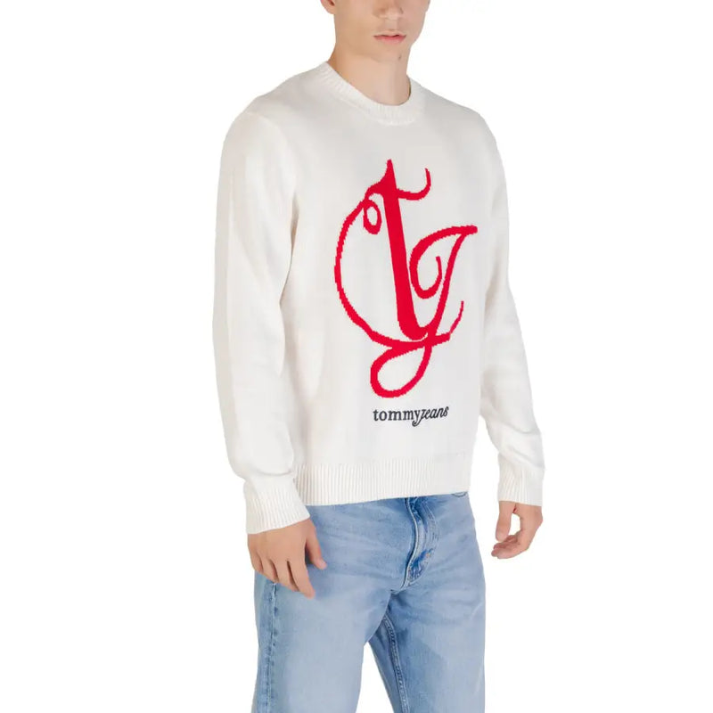 White sweater featuring a prominent red logo, perfect for casual and stylish wear