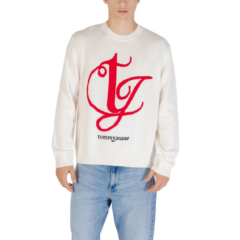 White sweater with red bold cursive logo and tommy brand name embroidered below on a cotton fabric front side