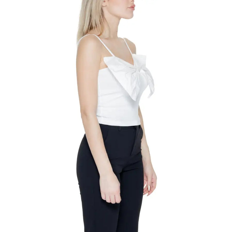 White satin camisole top with sweetheart neckline and large bow detail at the front for women’s elegant wear