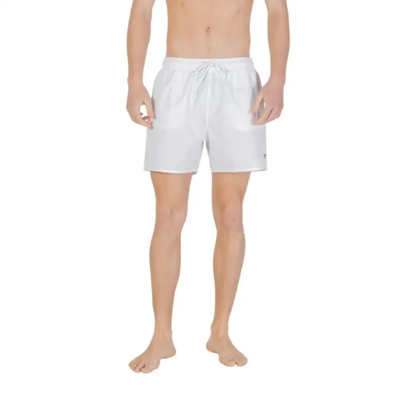 White swim trunks displayed in a product titled Black Swim Trunks for men’s swimwear