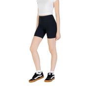 Woman wearing black biker shorts from Womens Black Biker Athletic Shorts collection