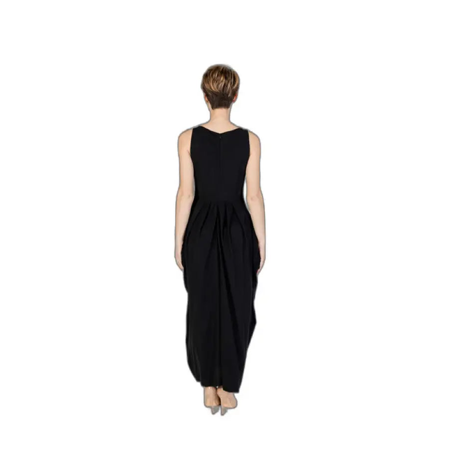 Woman in black Sandro Ferrone dress, stylish urban fashion