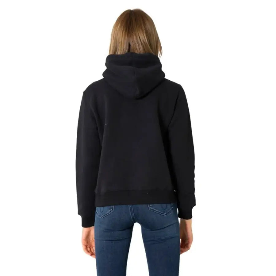 Woman in Calvin Klein Jeans black hoodie for women