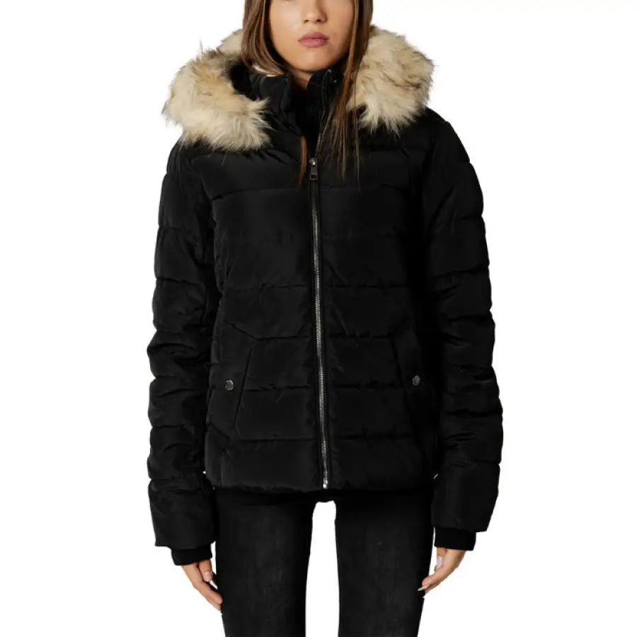 Woman in Only fall winter black fur collar jacket, perfect for women’s jackets season.