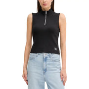 Woman wearing Calvin Klein Jeans white sleeveless zip turtleneck top and light wash denim