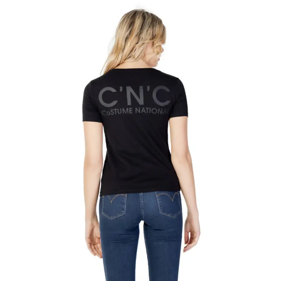 Woman in CNC Costume National black t-shirt display