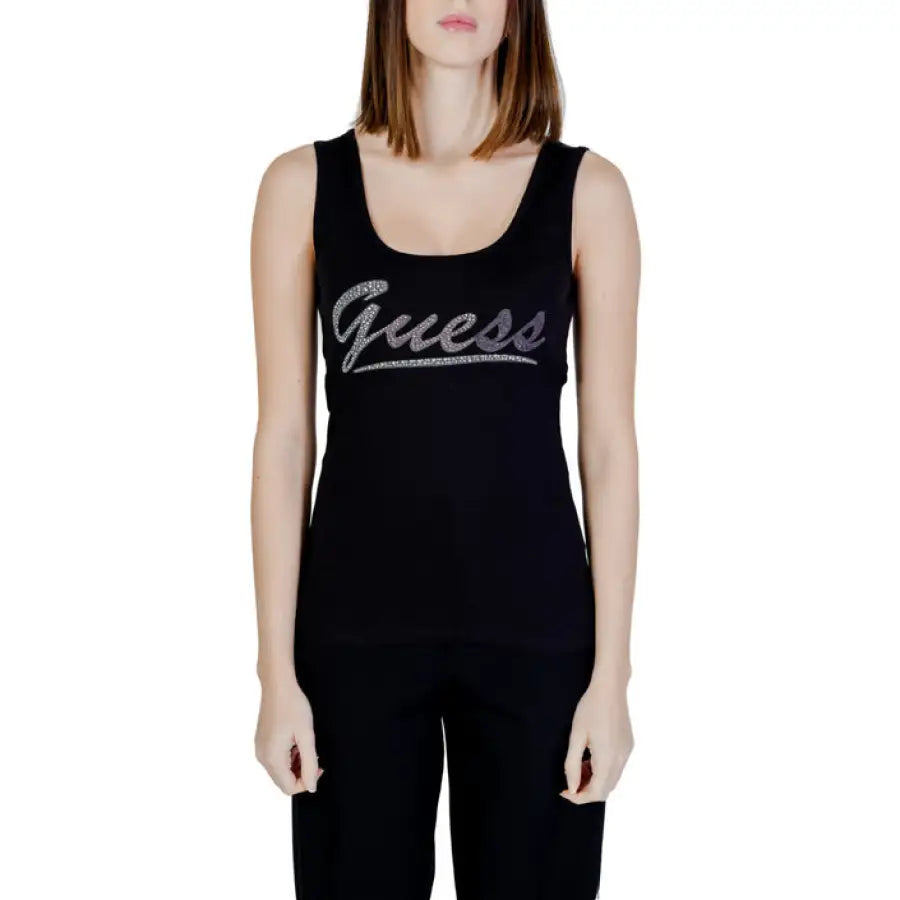 Guess women undershirt - woman in black tank top with ’yes’ logo