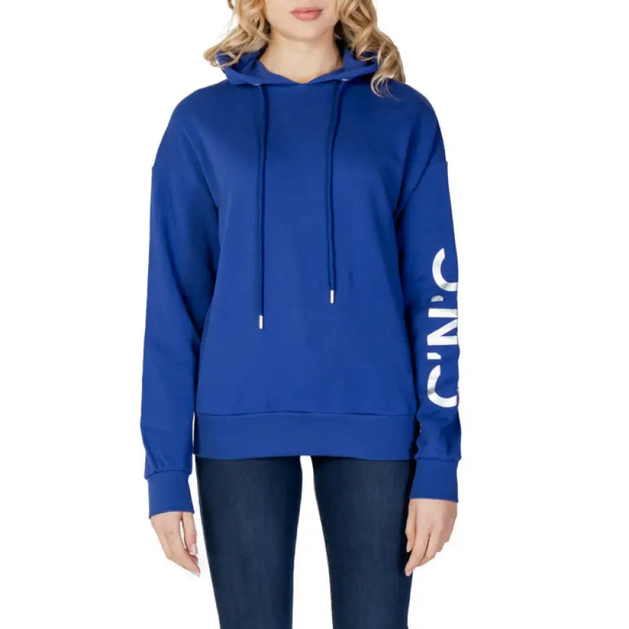 Woman in blue hoodie from CNC Costume National women sweatshirts collection